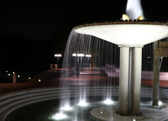 The Columbia Fountain lit up at night