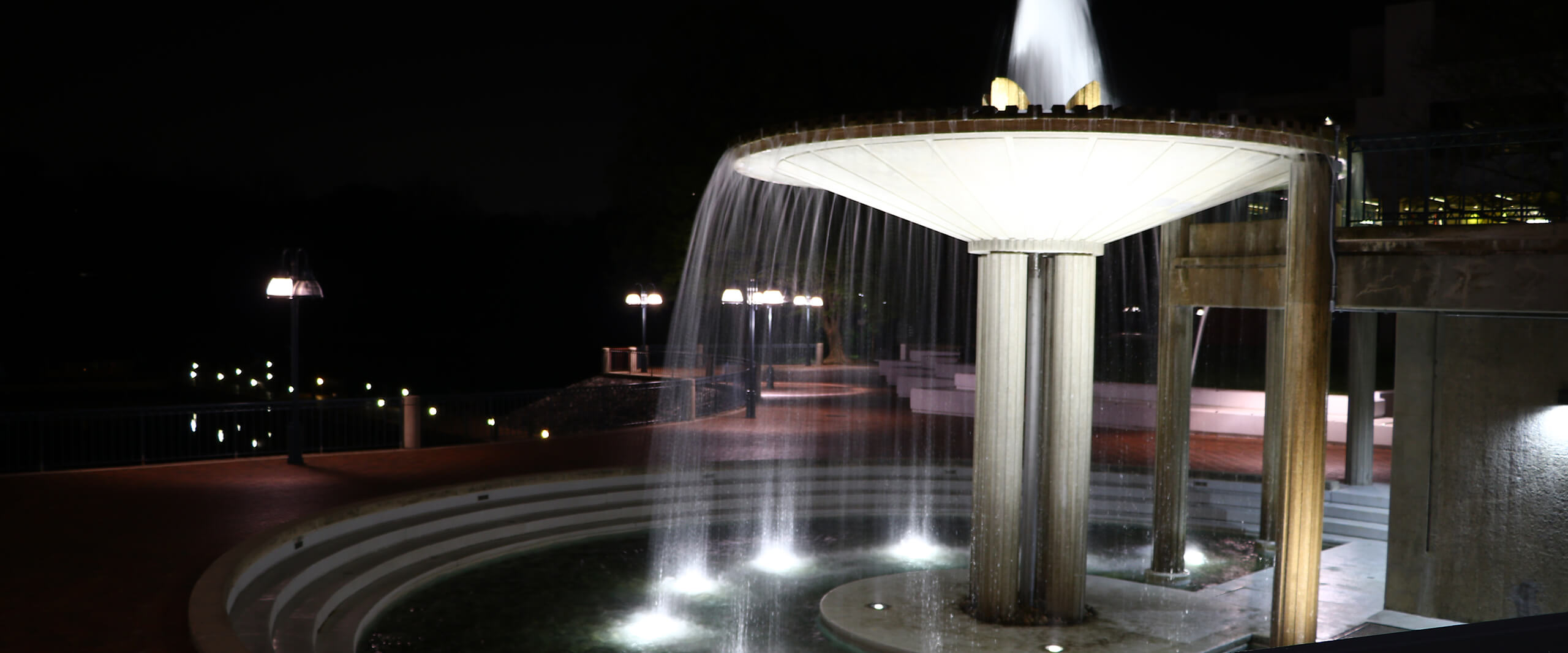 The Columbia Fountain lit up at night
