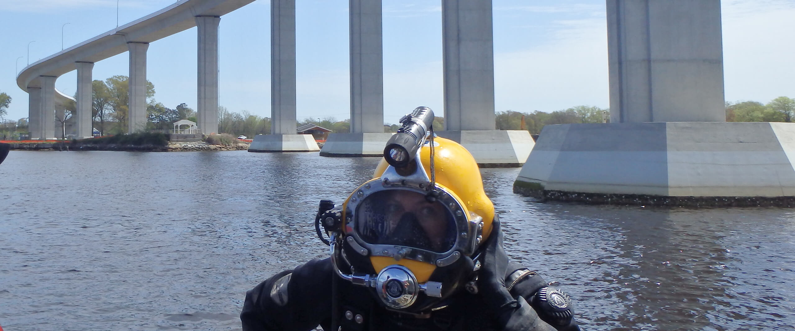 A diver in front of the Jordan Bridge