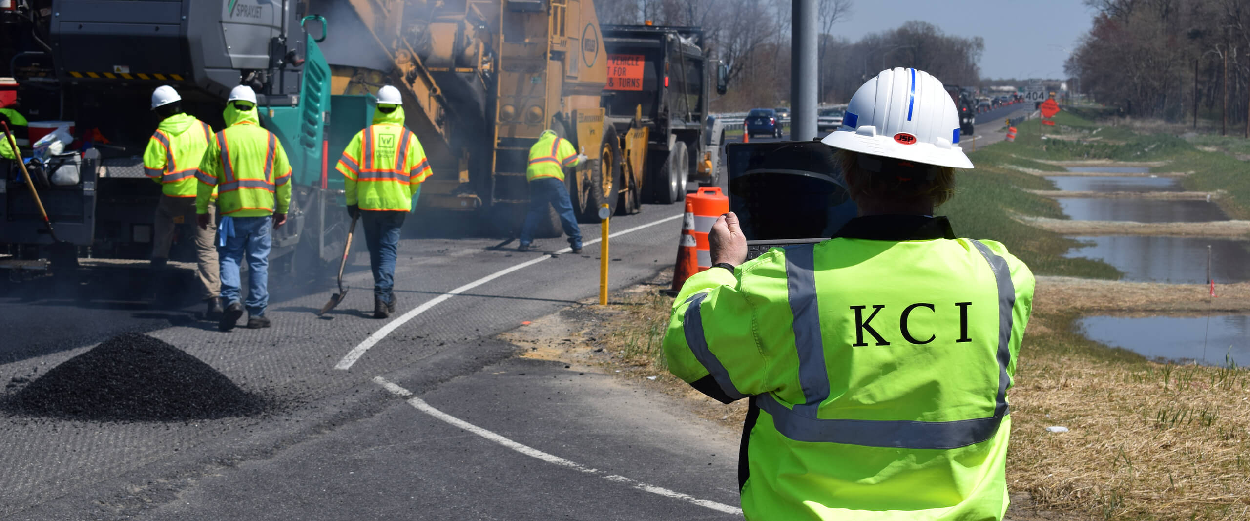 A KCI employee uses our proprietary application to track construction progress on MD 404