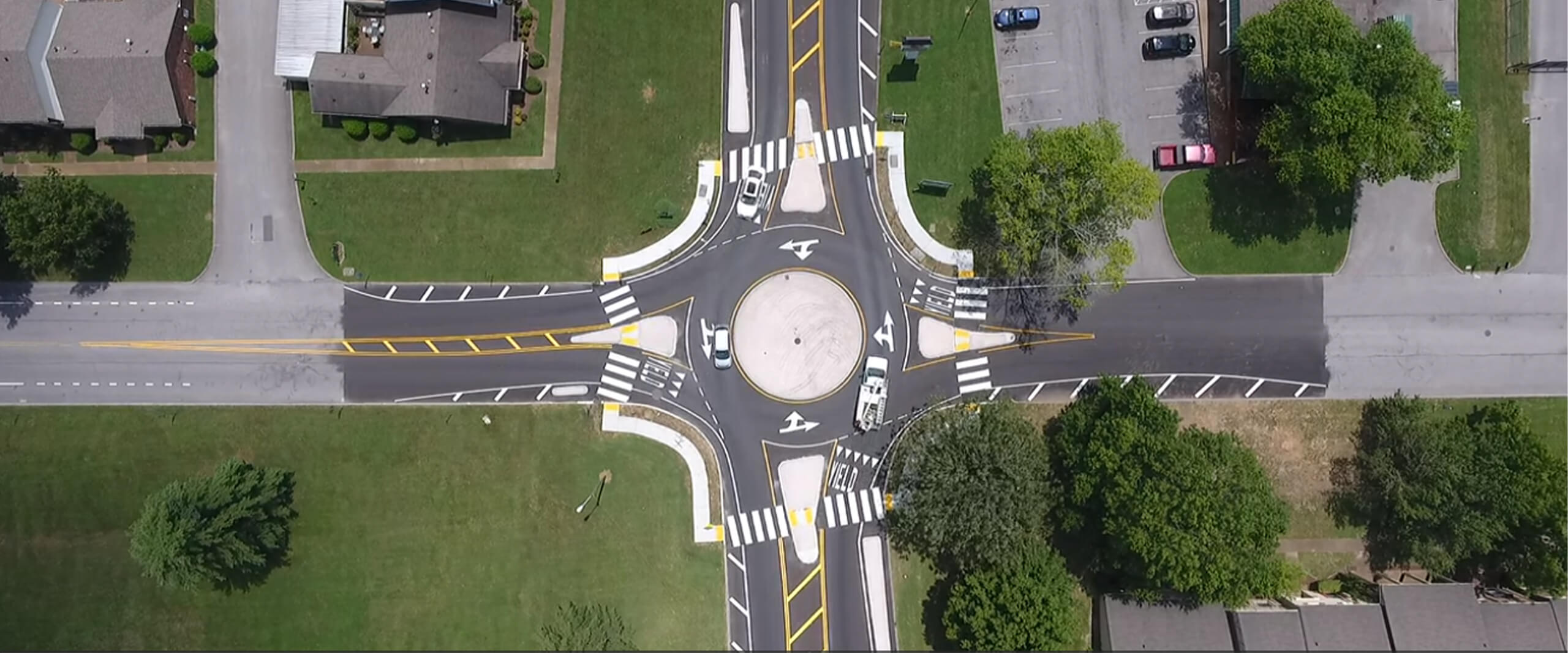 An aerial view of the mini roundabout at Sawyer Brown Road and Todd Preis Drive