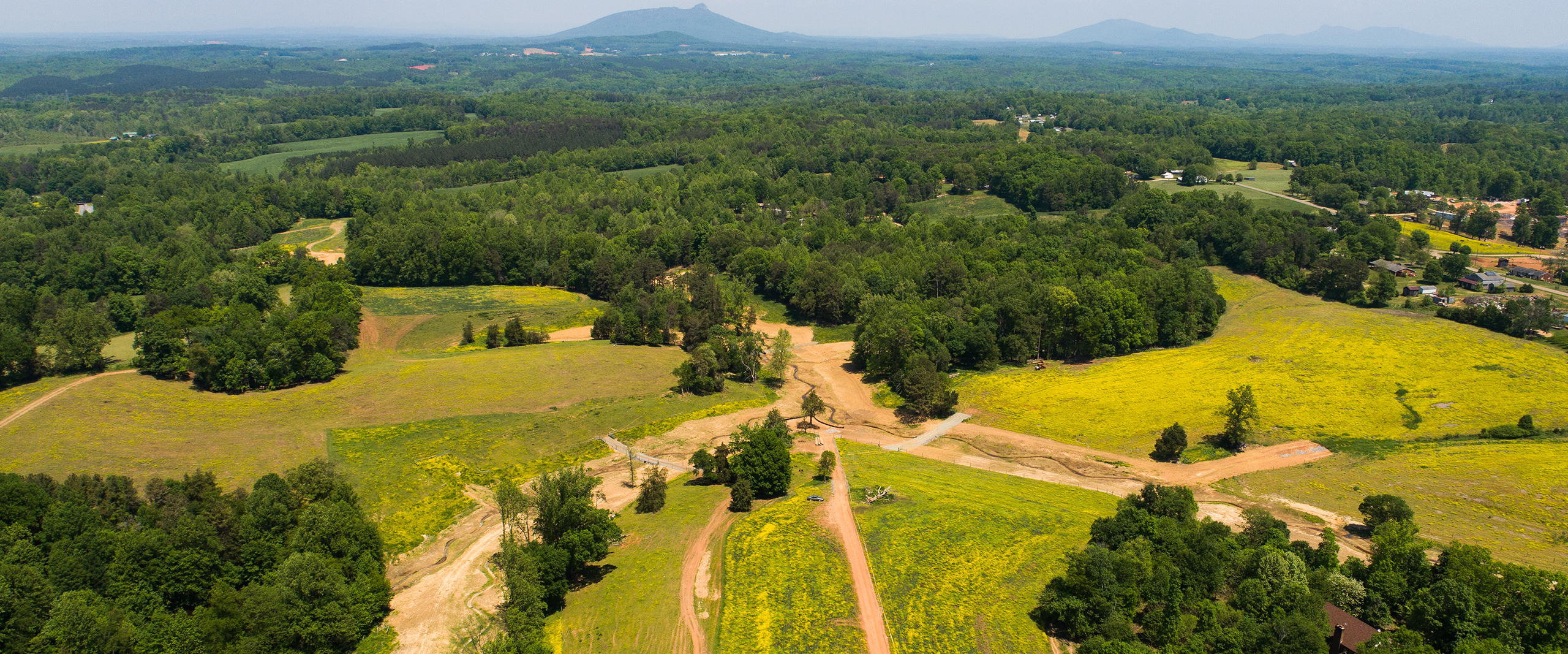 Restoration site with graded areas and access roads at Mill Dam Creek in Yadkin County, North Carolina