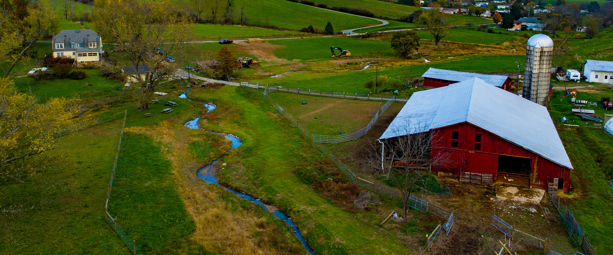 Stream corridor and farmstead at the Round Hill Branch project site in the French Broad River watershed